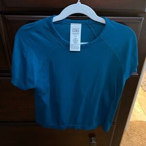 Athleta Girl Teal Short Sleeve Top size large (12)